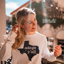 Load image into Gallery viewer, smiling female wearing Dallas Pets Alive! Adopt Y&#39;all white long sleeve t-shirt