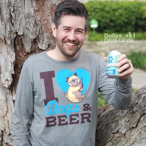 smiling male wearing grey long sleeve t-shirt with I HEART DOGS & BEER on the front